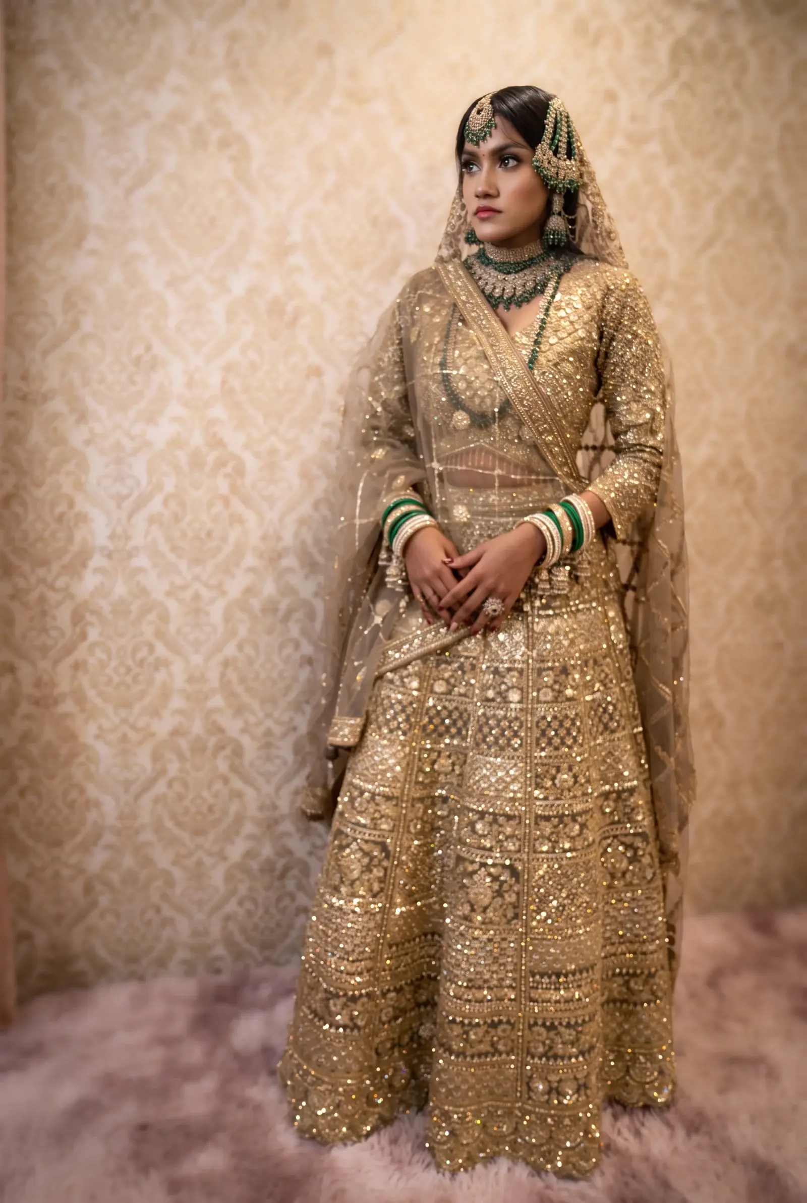 Gold bridal outfit styled by GlamourdollSG in a studio photoshoot