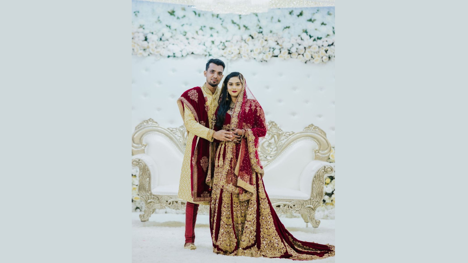 Classic red and ivory couple set for traditional Indian weddings in Singapore