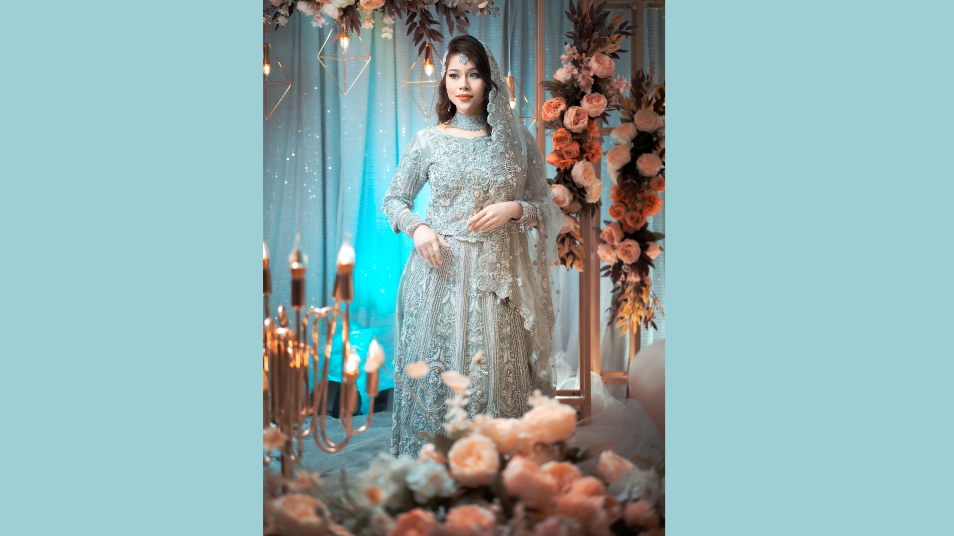 Maroon and gold traditional bridal ensemble with heavy embroidery