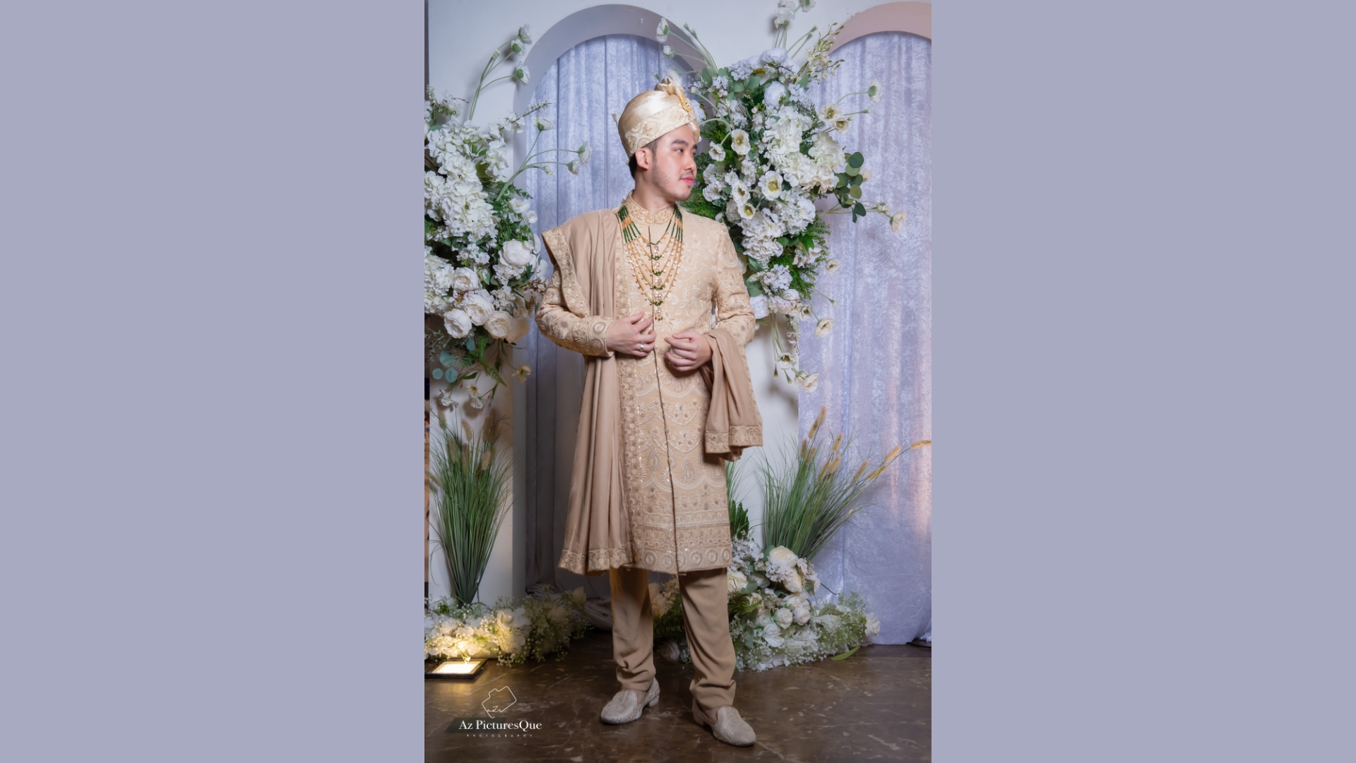 Classic ivory sherwani with gold embroidery for Singapore weddings