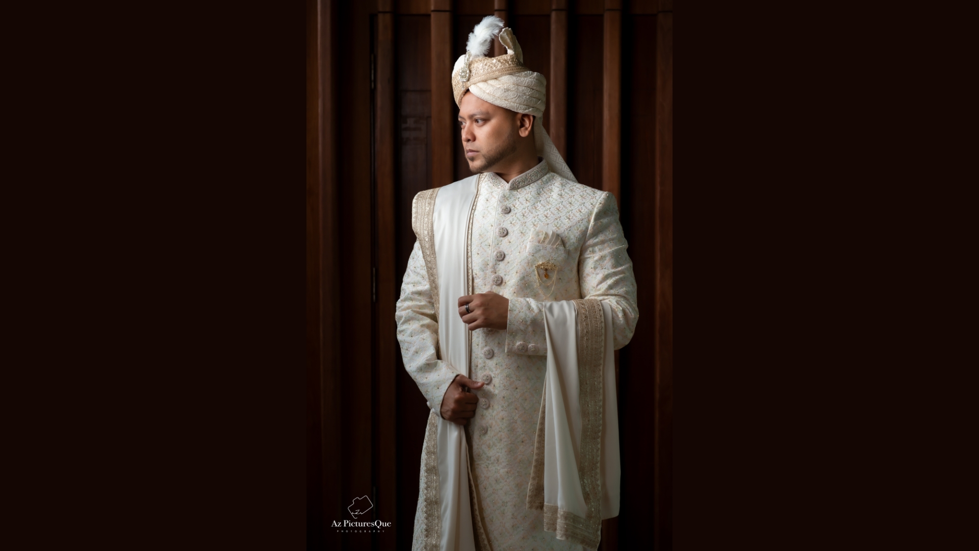 Royal blue velvet sherwani with traditional motifs and embroidery