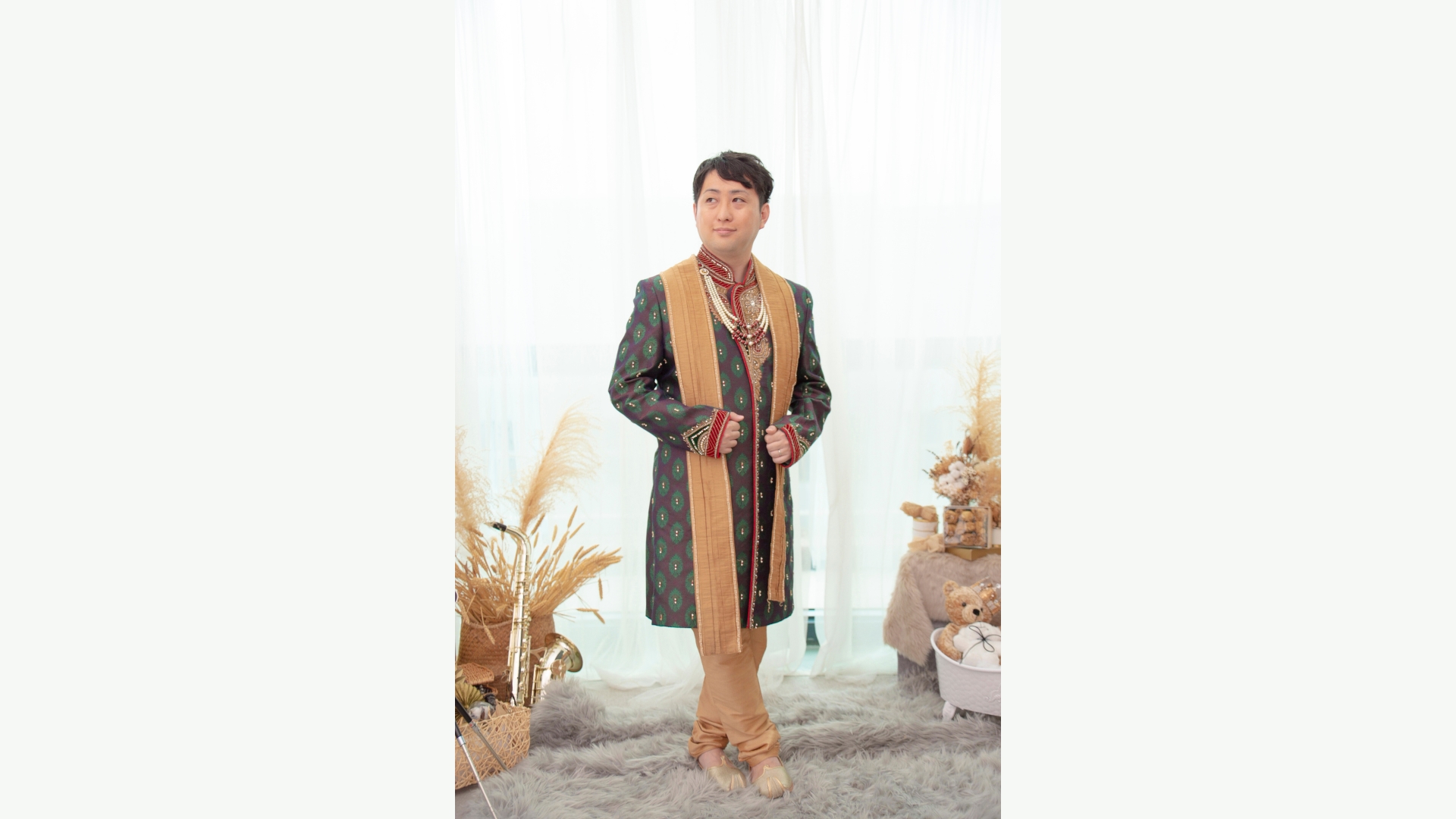 Black and gold designer sherwani for sophisticated groom style