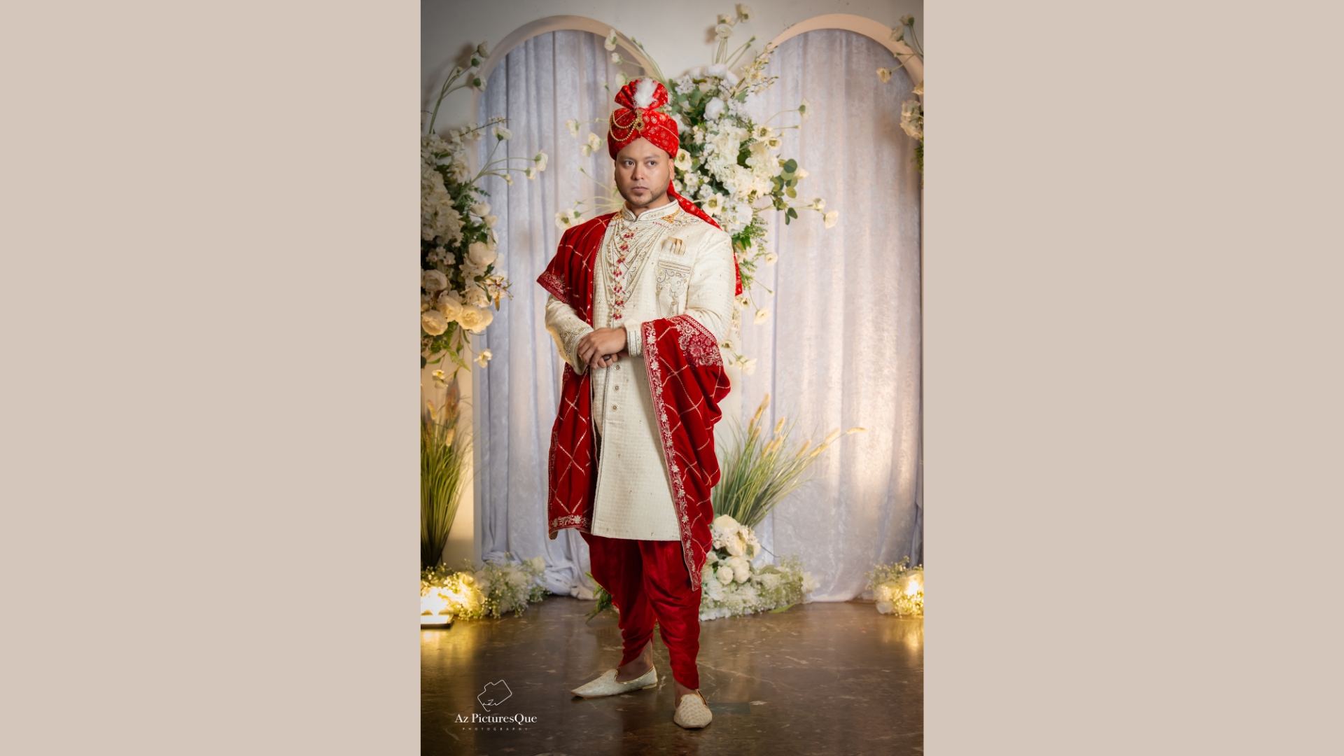 Burgundy embroidered sherwani with detailed craftsmanship